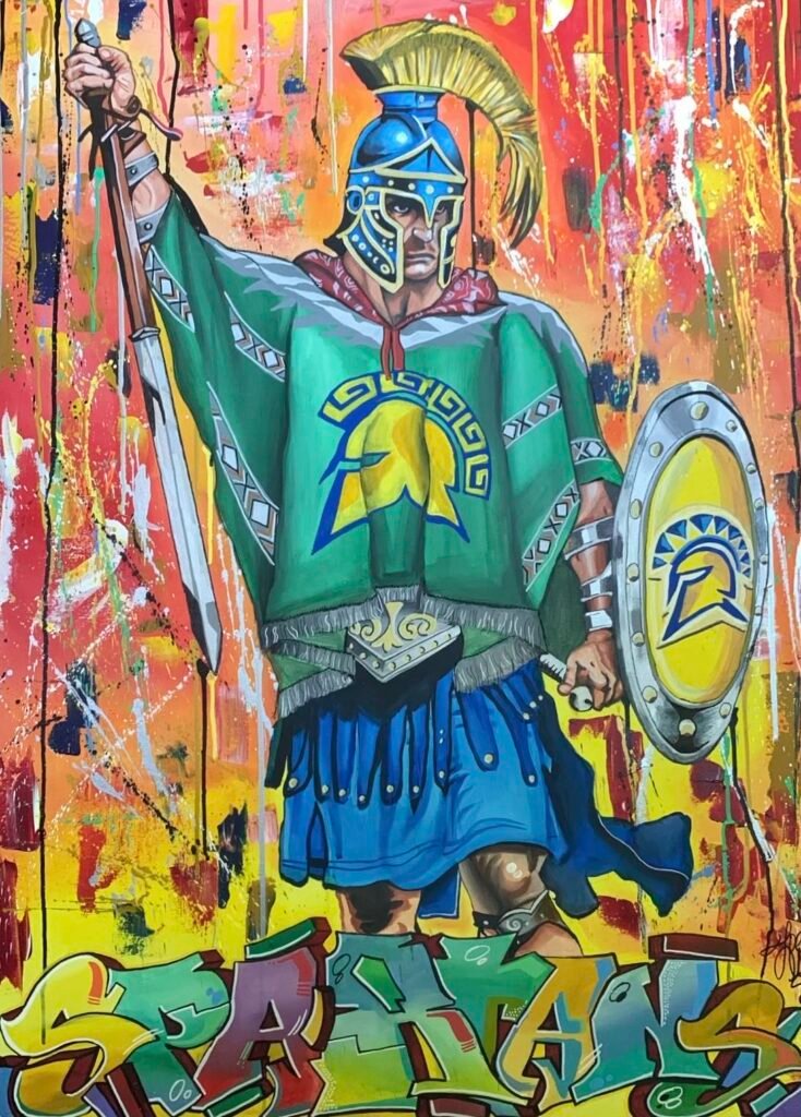 his bold and dynamic artwork features a fierce Spartan warrior, blending ancient armor with modern street art influences. The colorful background and graffiti-style text give the piece an energetic, contemporary feel, while the warrior stands strong, symbolizing courage and resilience. It's a powerful fusion of history and urban art.