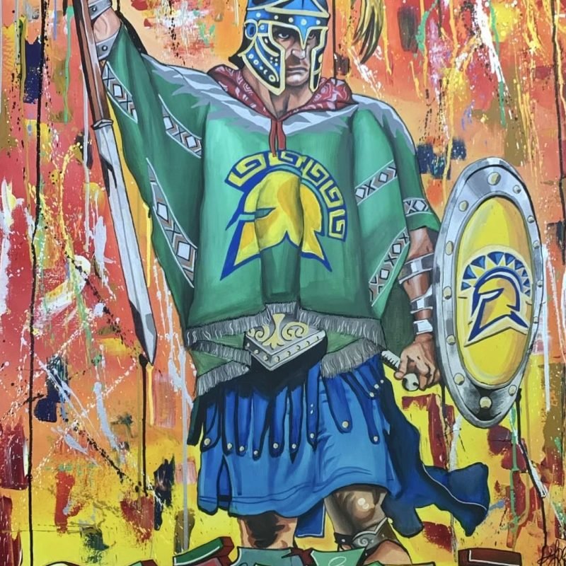 his bold and dynamic artwork features a fierce Spartan warrior, blending ancient armor with modern street art influences. The colorful background and graffiti-style text give the piece an energetic, contemporary feel, while the warrior stands strong, symbolizing courage and resilience. It's a powerful fusion of history and urban art.